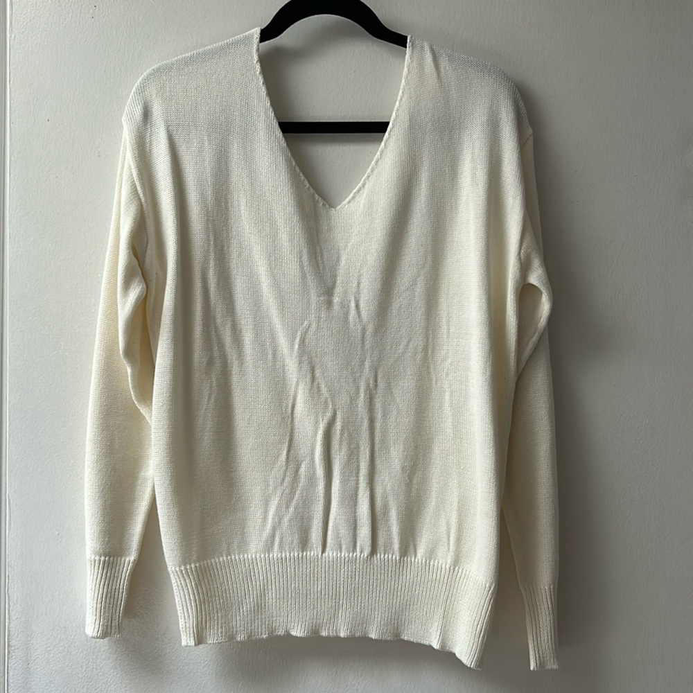Twist, opened back sweater